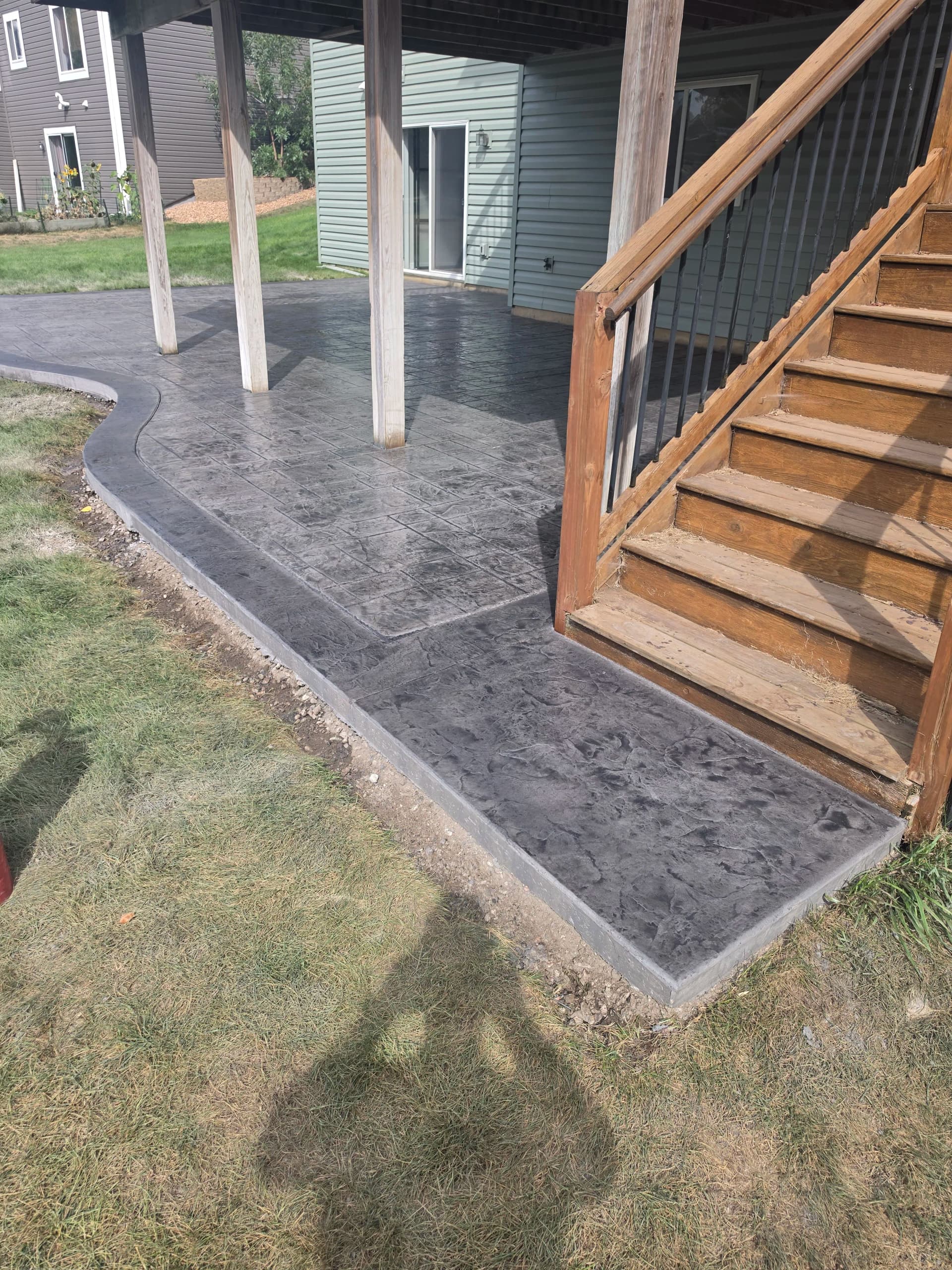 Stamped Patios, Aprons, and Broom Finish Work - A Busy Week Recap image