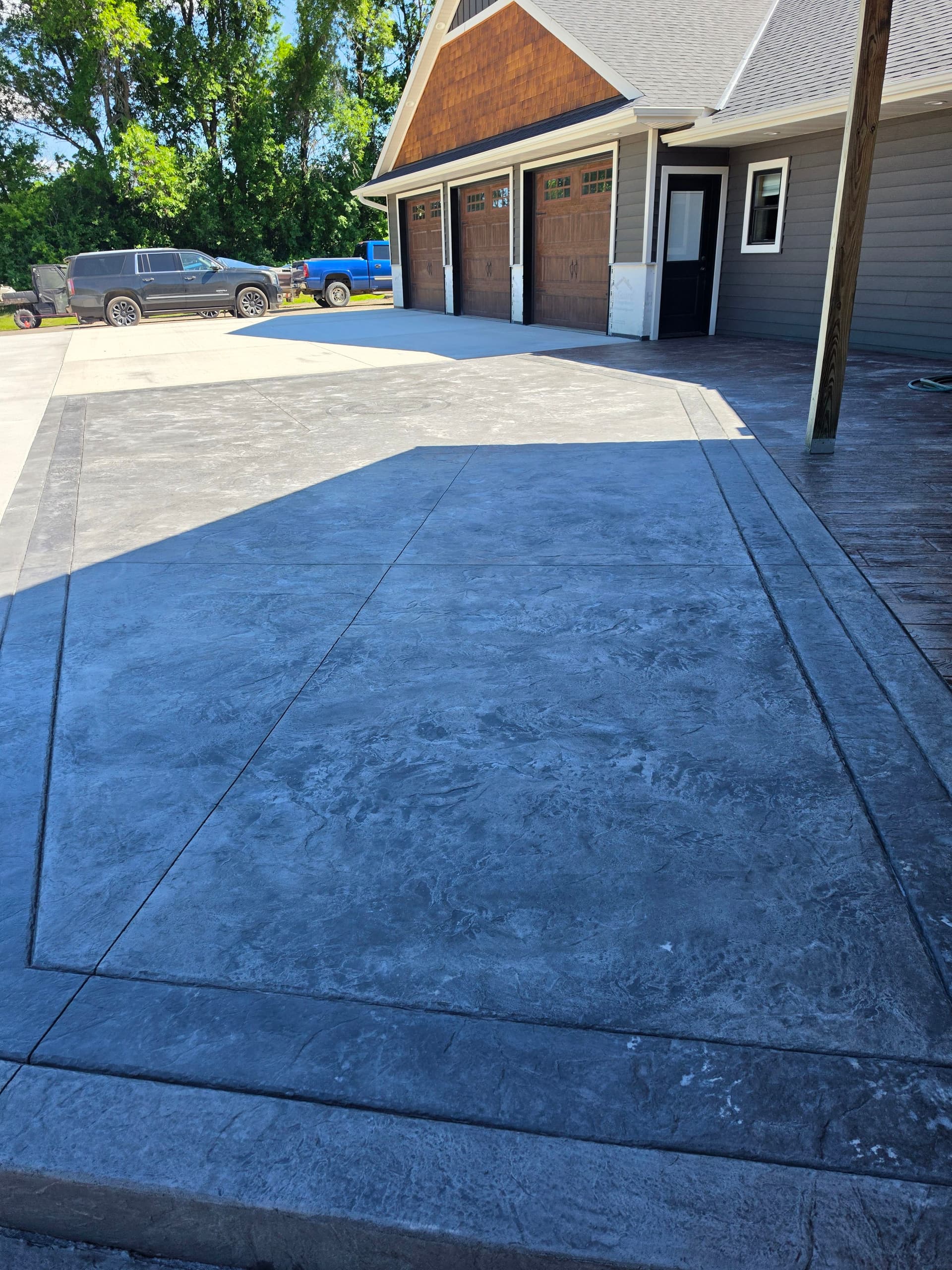 Gallery photos for Stamped Patios, Steps, Borders, and a Broom-Finish Driveway Built as One: Image #3