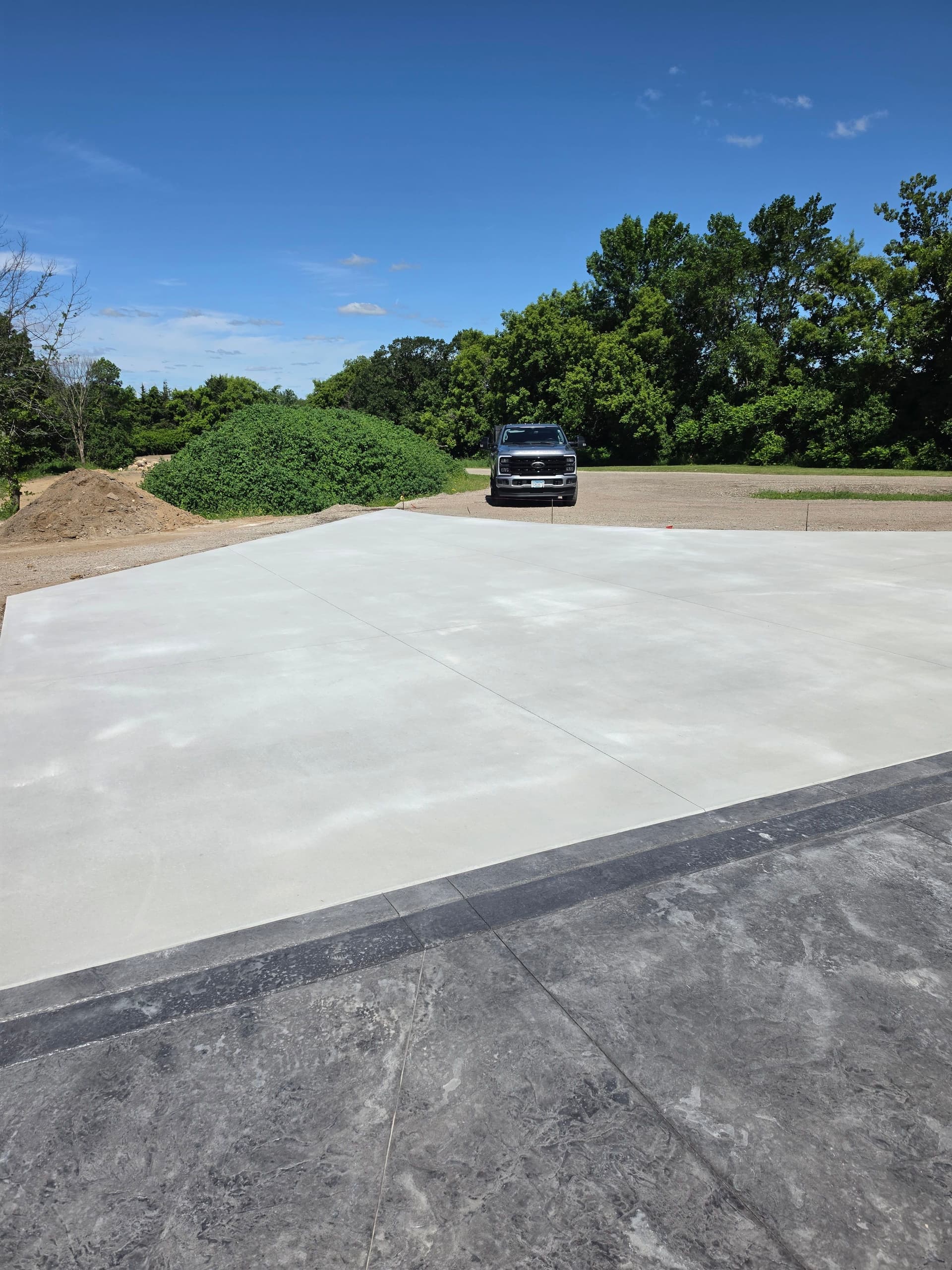 Gallery photos for Stamped Patios, Steps, Borders, and a Broom-Finish Driveway Built as One: Image #9