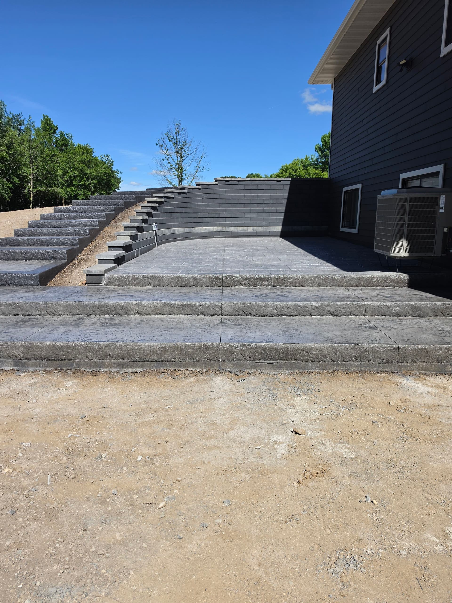Gallery photos for Stamped Patios, Steps, Borders, and a Broom-Finish Driveway Built as One: Image #8