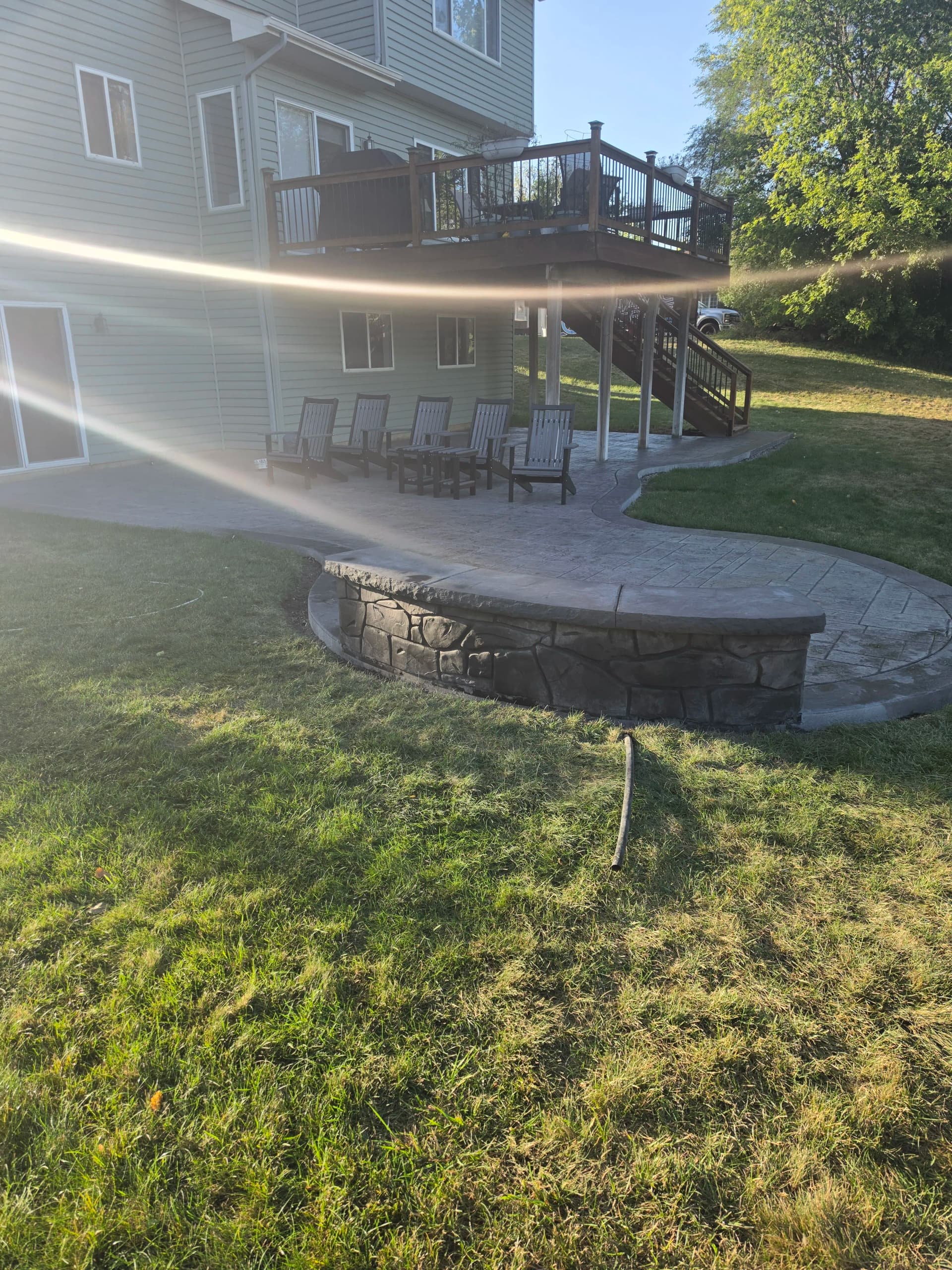 Stamped Concrete Patios, Seat Walls, and Driveway Extensions Done Right image