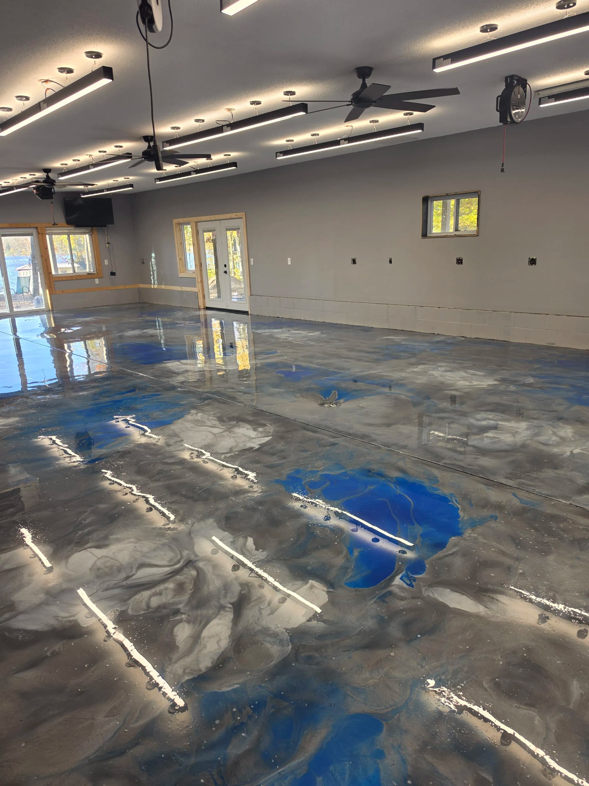 Metallic Epoxy, Flake Coatings, and Stamped Concrete - A Busy Season Recap image