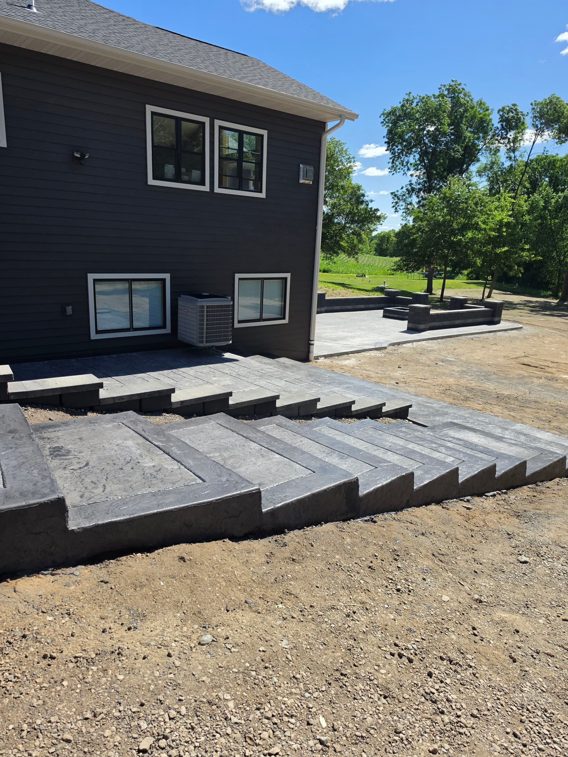 Gallery photos for Stamped Patios, Steps, Borders, and a Broom-Finish Driveway Built as One: Image #6