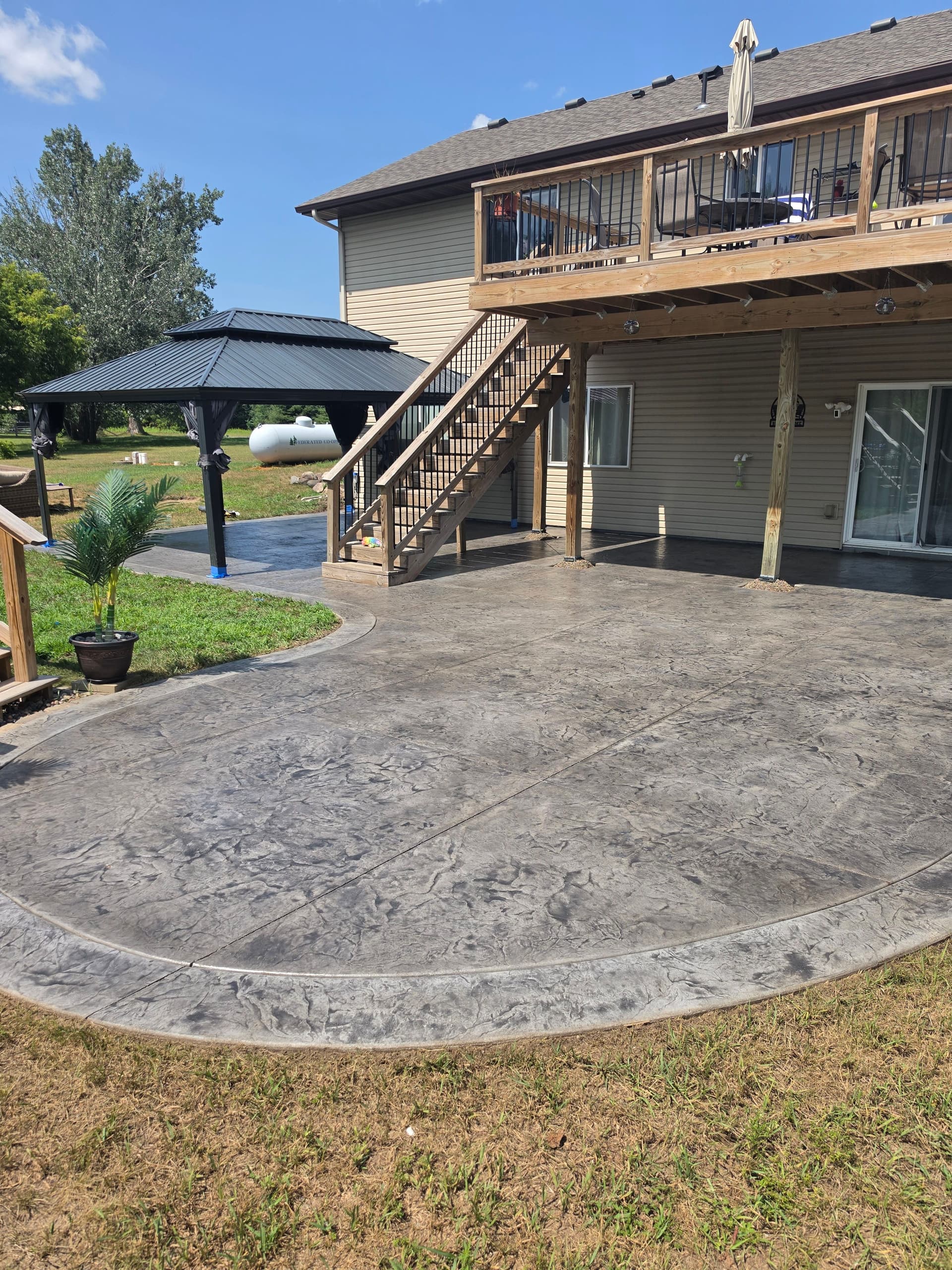 Gallery photos for Stamped Concrete Patios That Turn Backyards Into Usable Space: Image #4