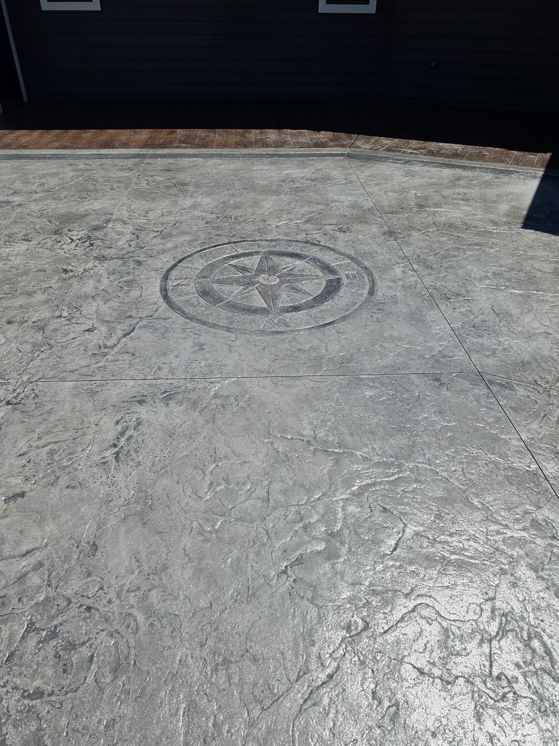 Gallery photos for Stamped Patios, Steps, Borders, and a Broom-Finish Driveway Built as One: Image #1