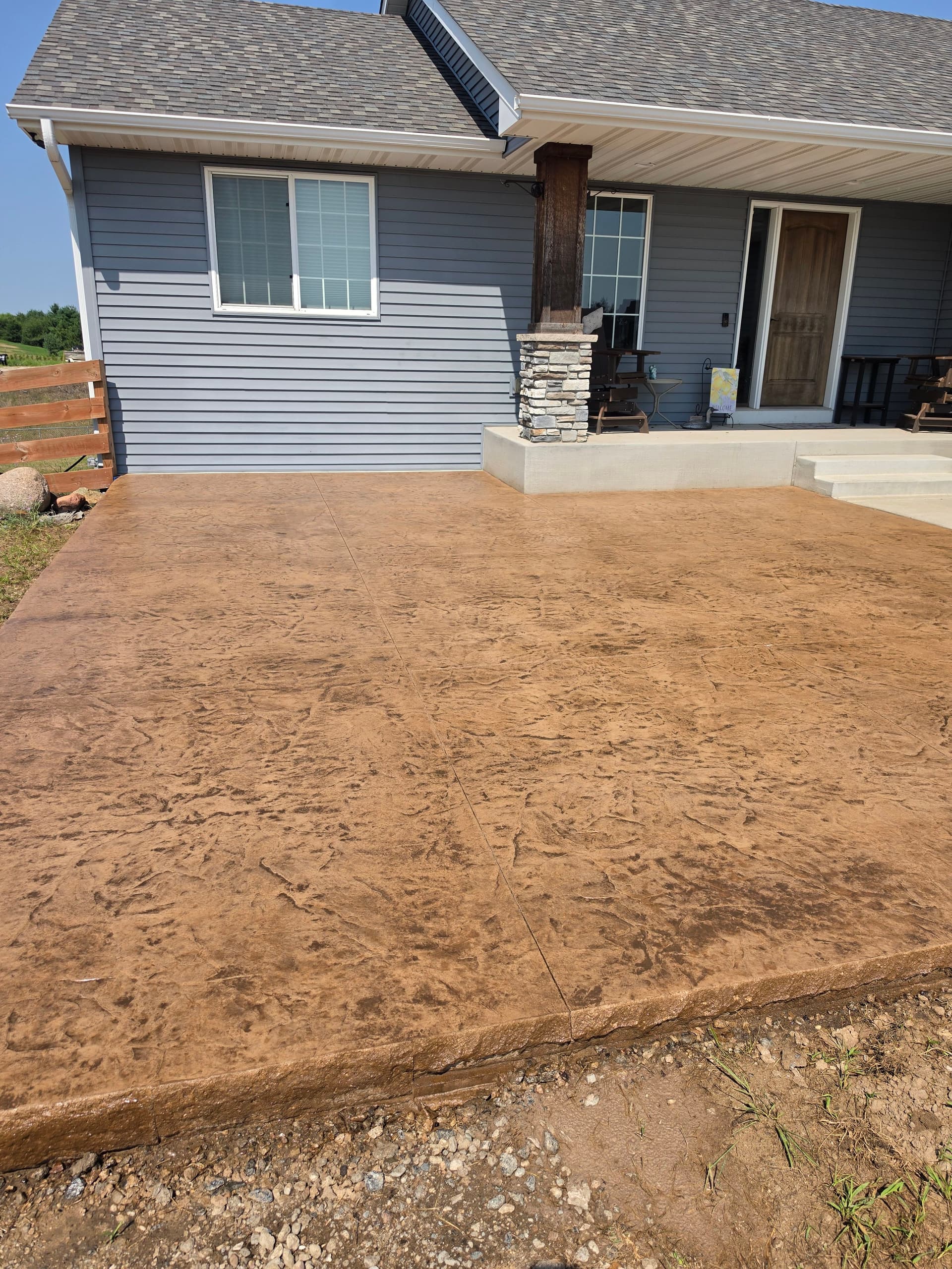 Gallery photos for Stamped Concrete Patios That Turn Backyards Into Usable Space: Image #7