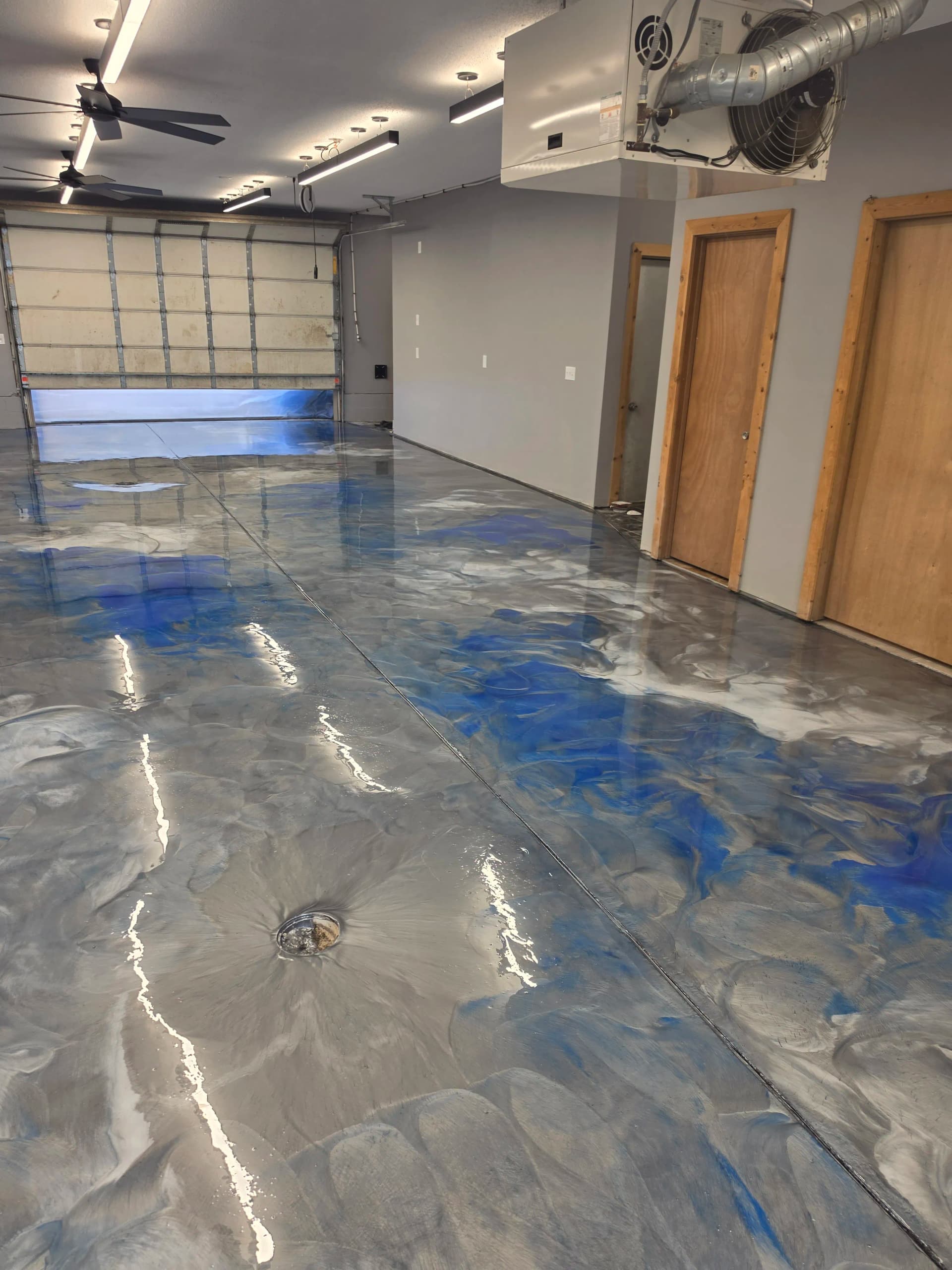 Gallery photos for Metallic Epoxy, Flake Coatings, and Stamped Concrete - A Busy Season Recap: Image #1