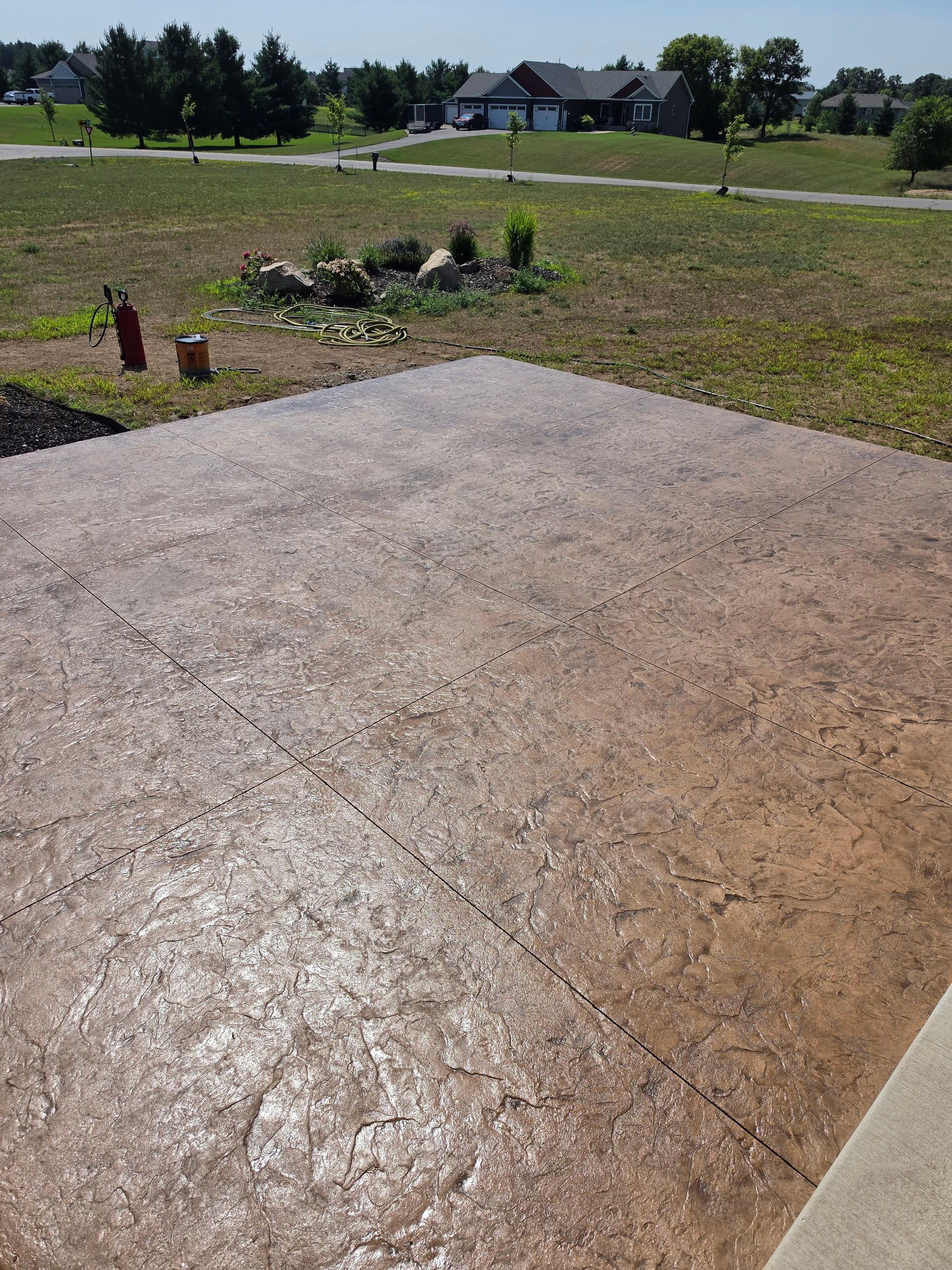 Gallery photos for Stamped Concrete Patios That Turn Backyards Into Usable Space: Image #5