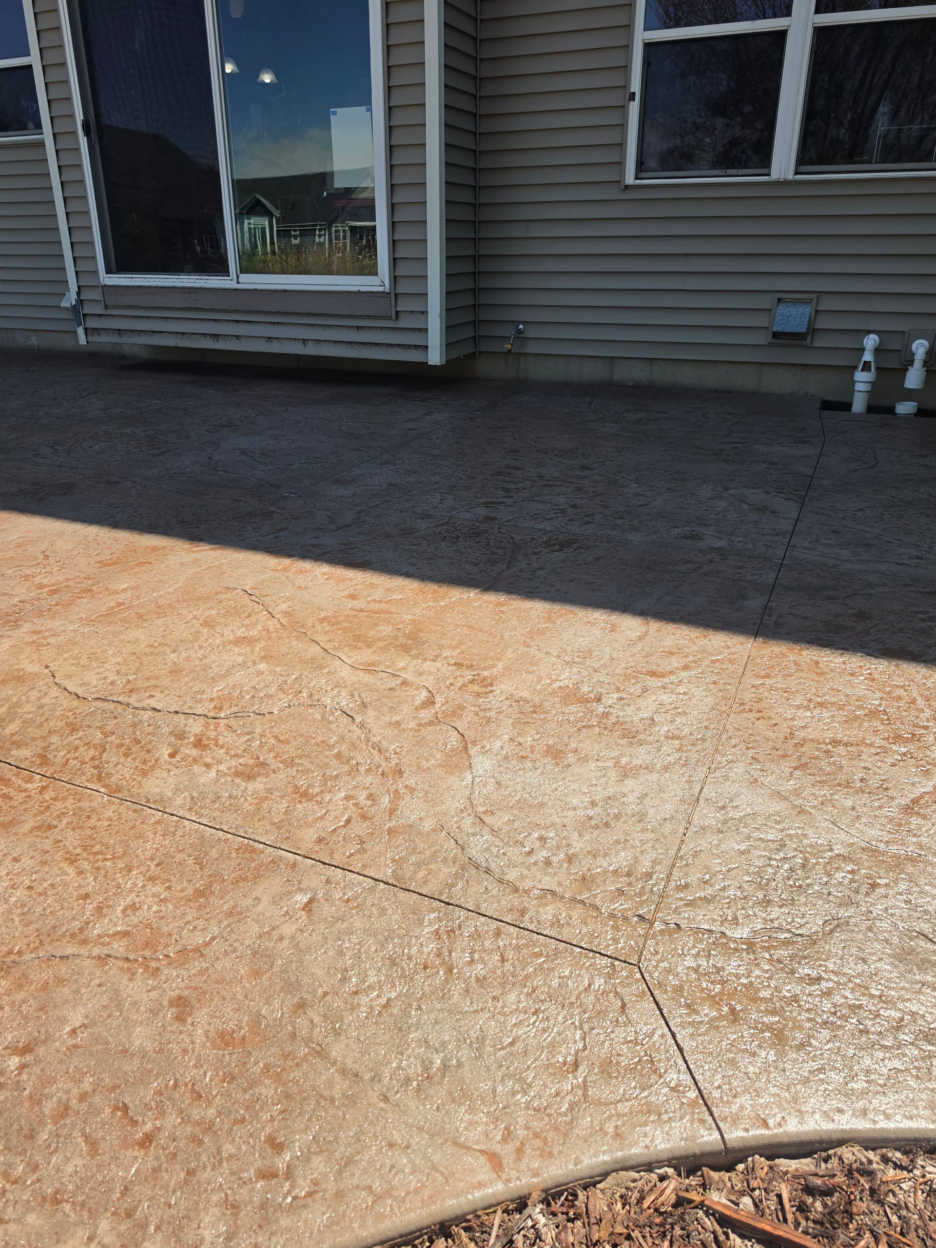 4 Backyard Concrete Patios Built in One Week image