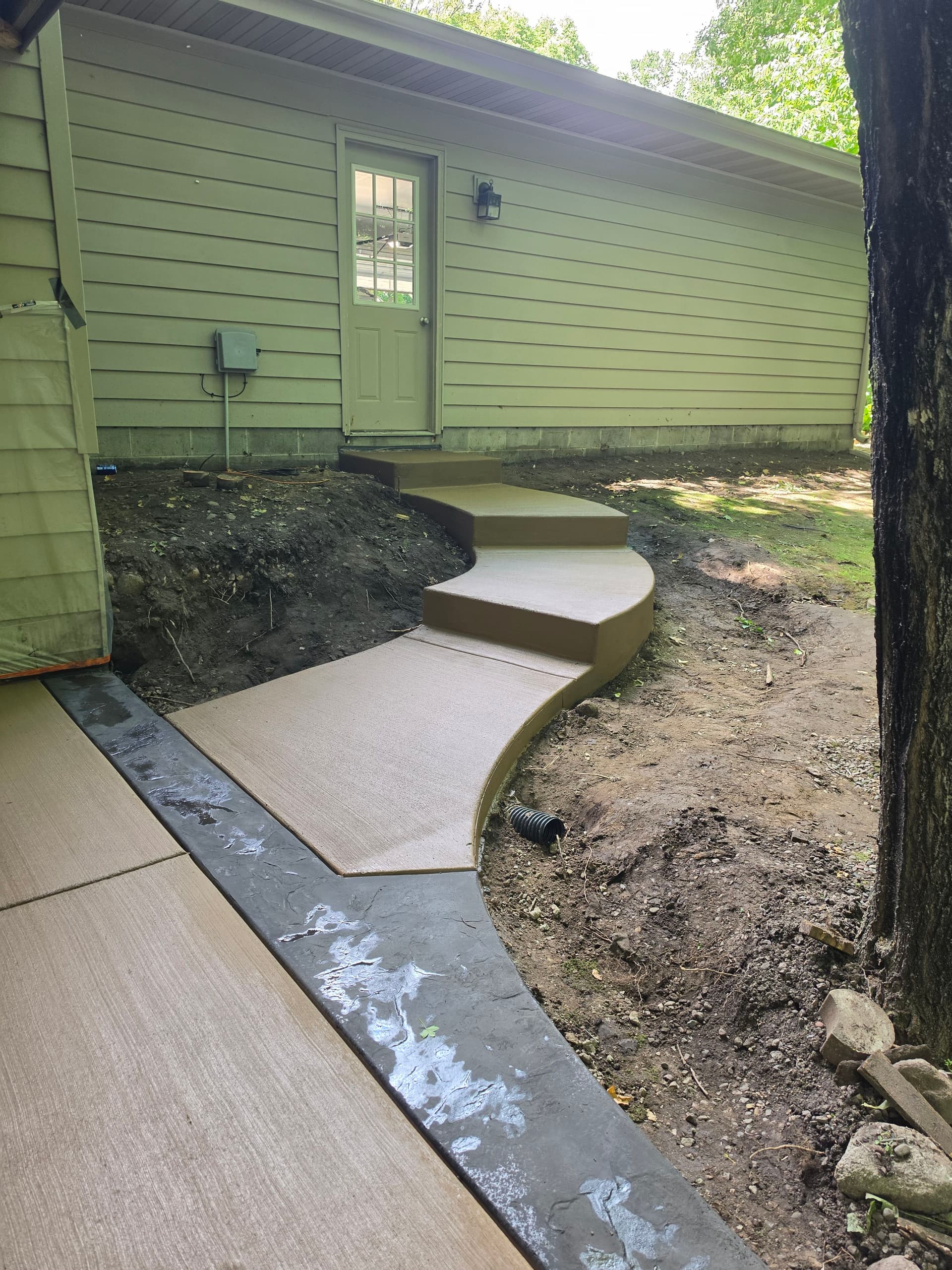 Gallery photos for 4 Backyard Concrete Patios Built in One Week: Image #5
