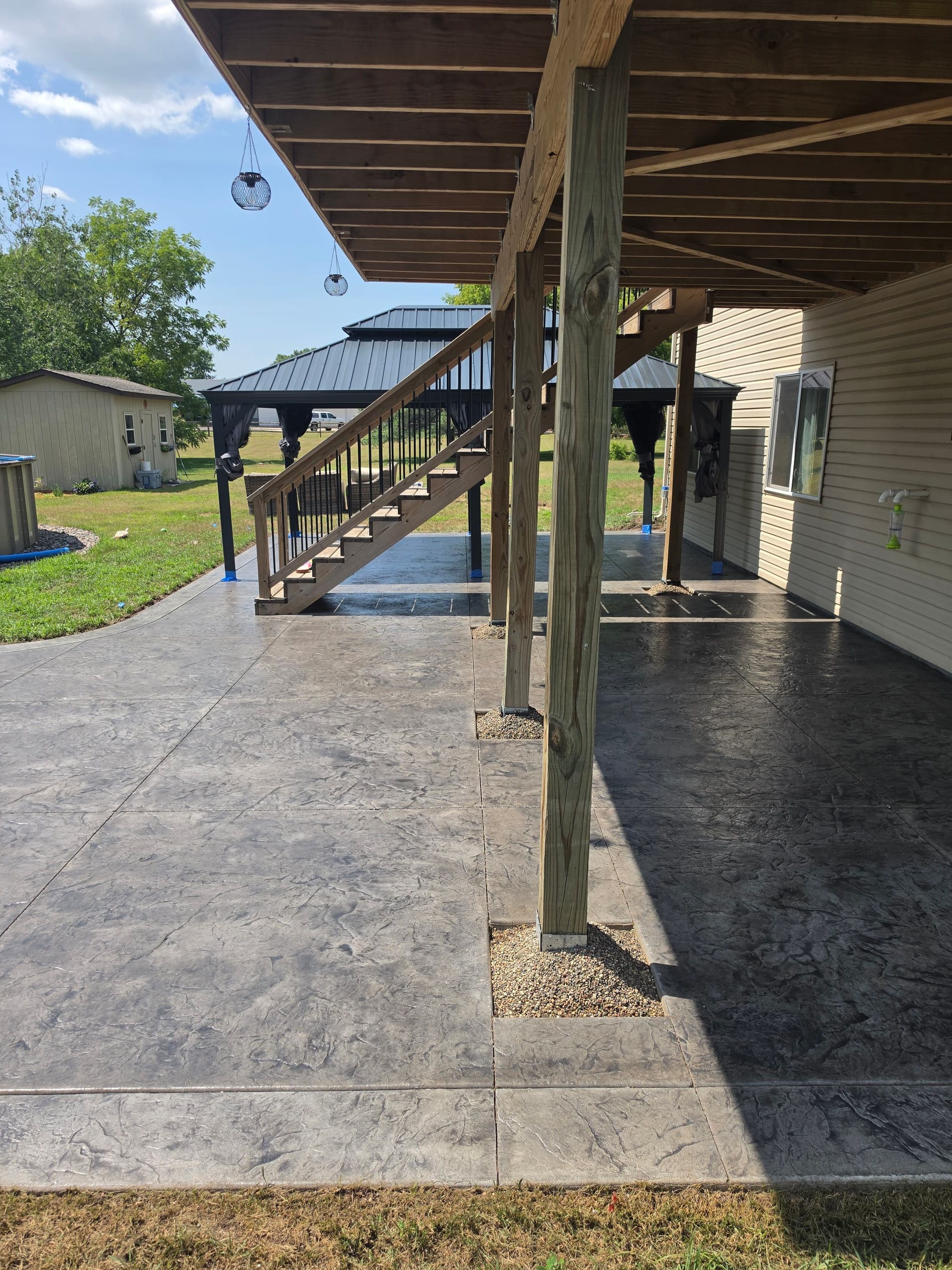 Gallery photos for Stamped Concrete Patios That Turn Backyards Into Usable Space: Image #3