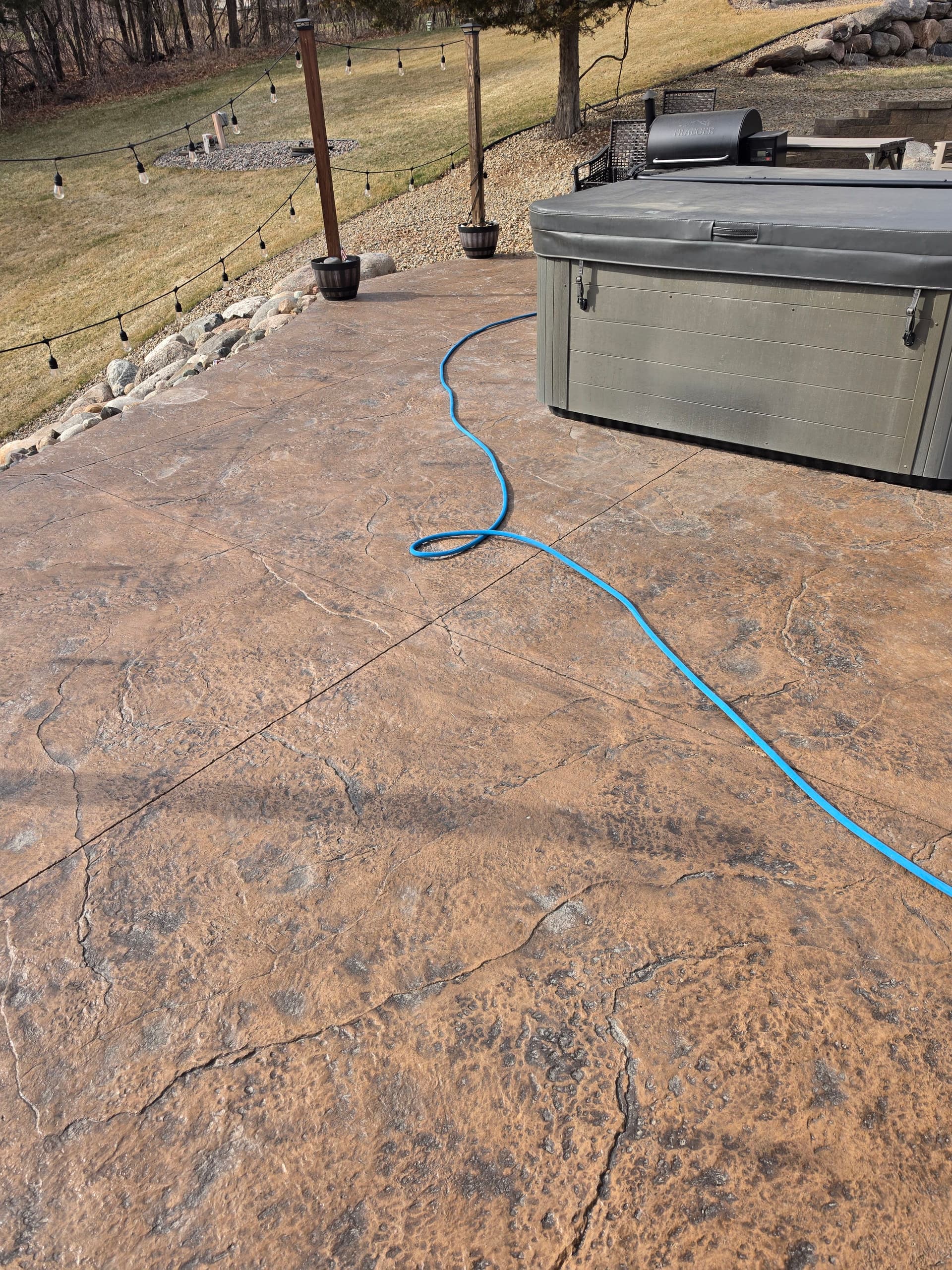 Stamped Concrete Patio Clean and Re-Seal Results image