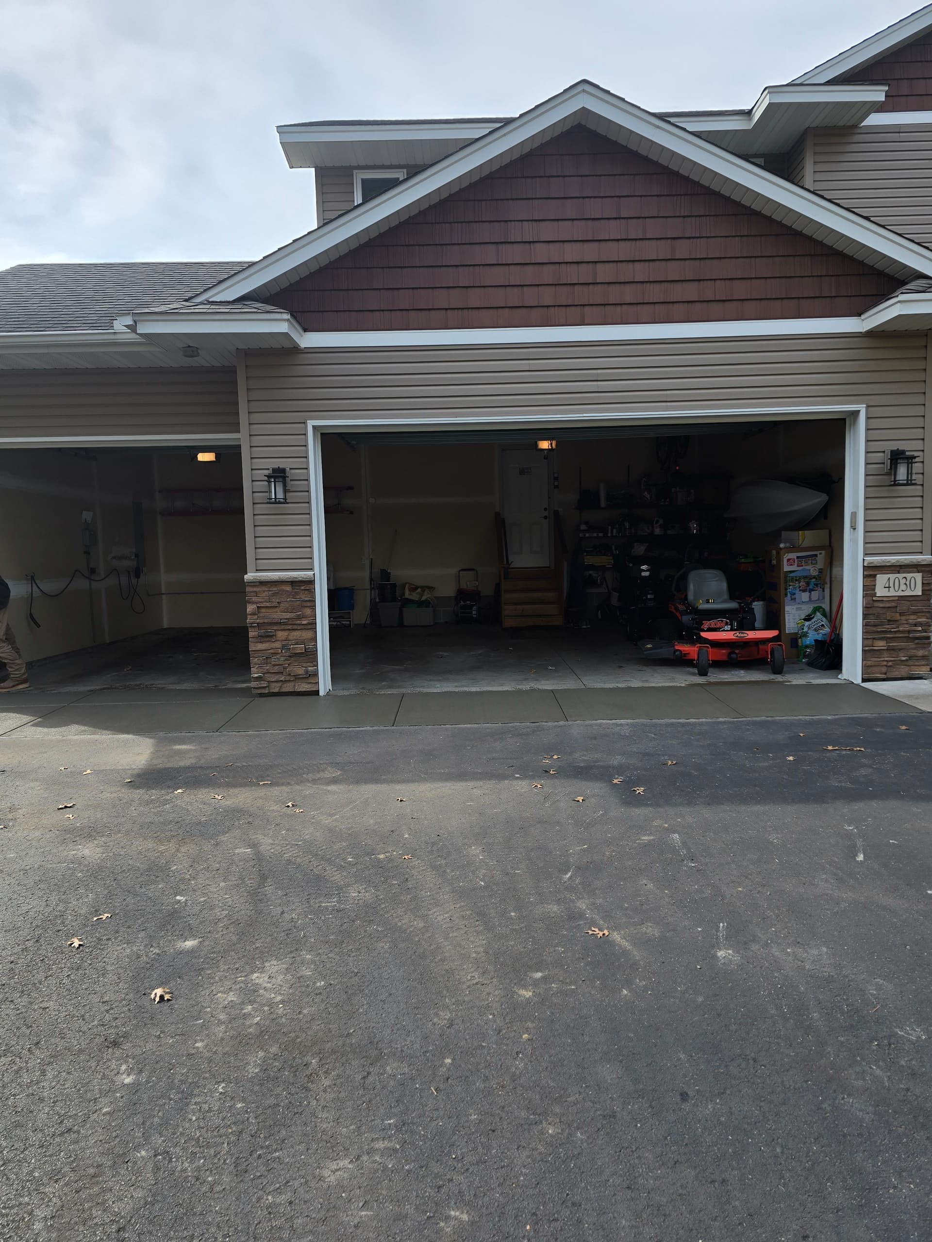 Gallery photos for Fresh Concrete Apron Poured Over a Settling Asphalt Driveway: Image #1