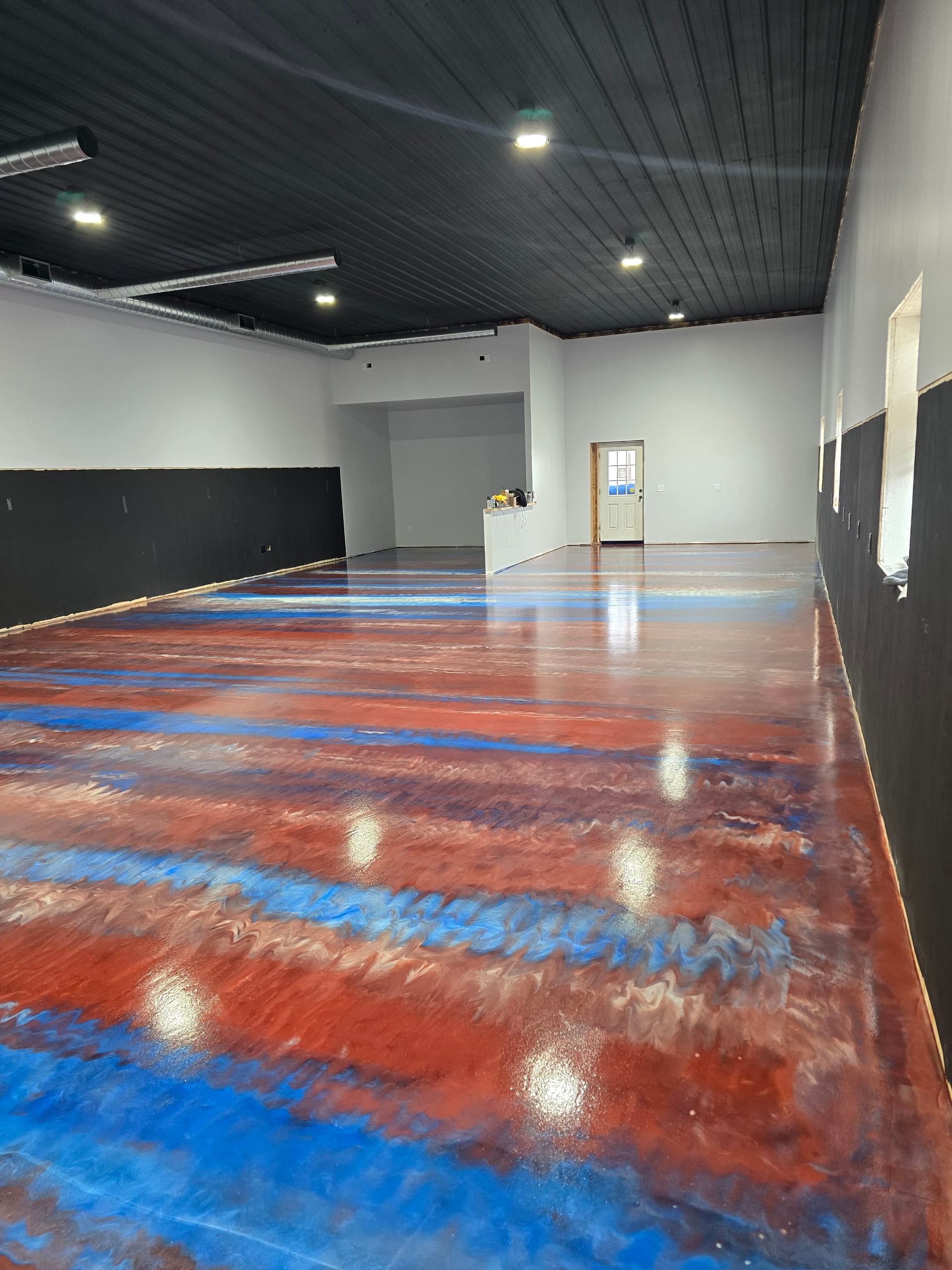 Red White and Blue Metallic Epoxy Floor Coating on a Large Commercial Space image