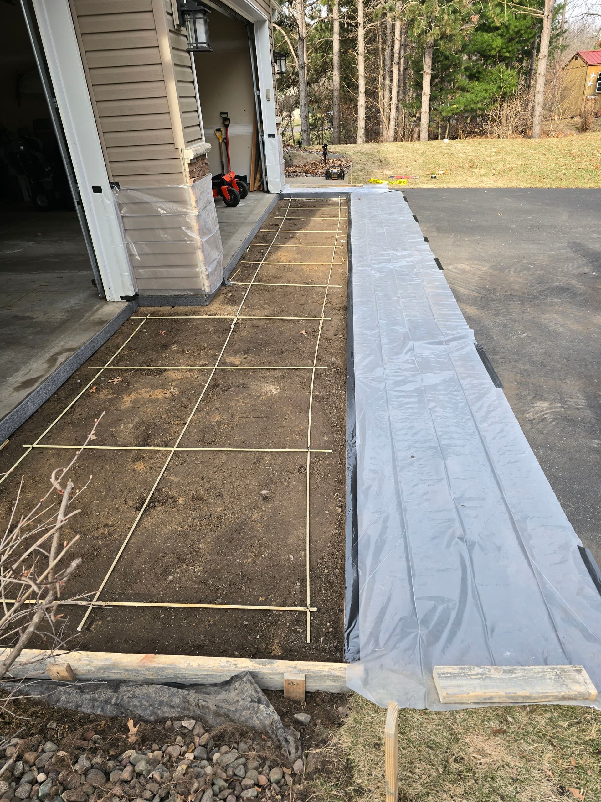 Gallery photos for Fresh Concrete Apron Poured Over a Settling Asphalt Driveway: Image #3